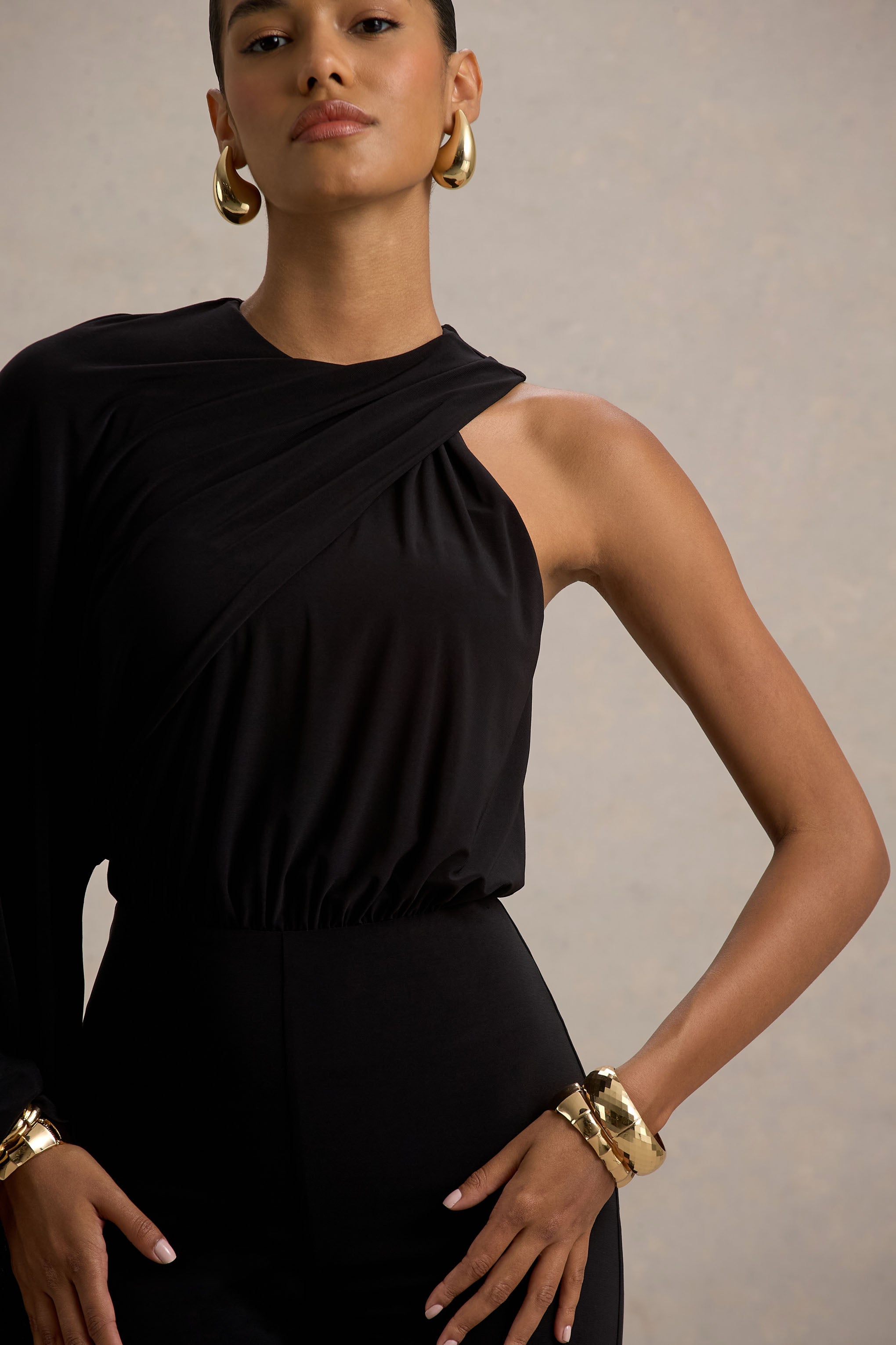 Asra | Black High-Neck Flared-Leg Jumpsuit With Cape Sleeve
